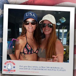 Two girls wearing official USA hats