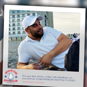 Chill guy on beach wearing our Official White USA hat before volleyball game