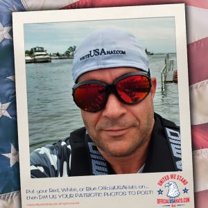 Guy on jetski with backwards white USA hat