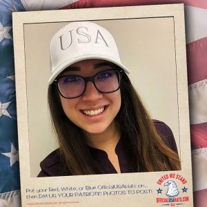 Girl with cool black glasses sporting our Official White USA Hat
